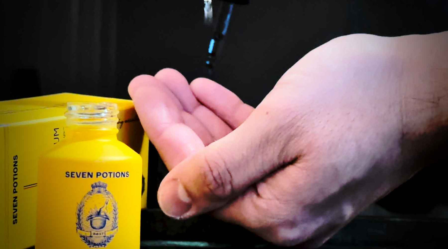 Men’s beard care ritual with beard oil being applied to the hand