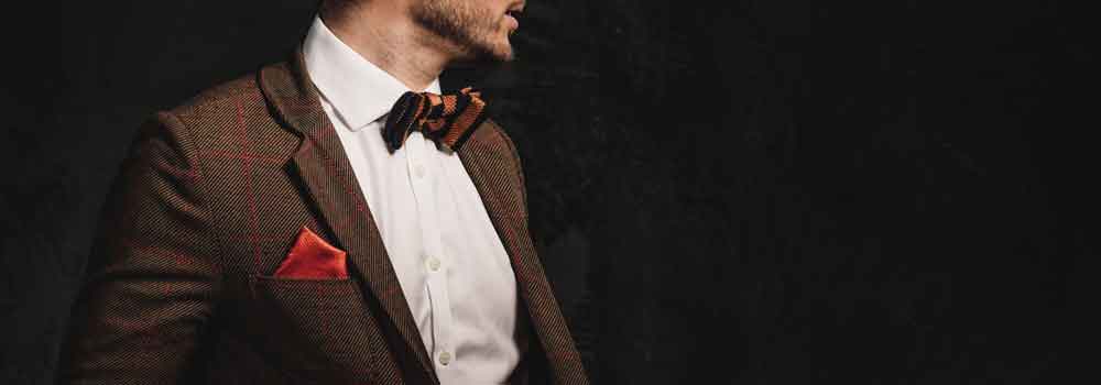 the-modern-gentleman-dressed-in-tweed-suit-and-bow-tie