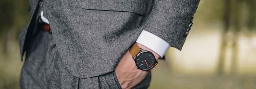 the-modern-gentleman-grey-suit-with-a-luxury-watch