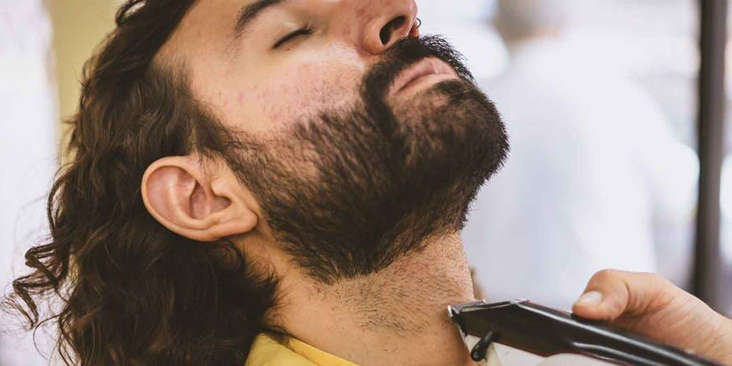 the-modern-gentleman-male-getting-beard-trimmed-at-the-barbers