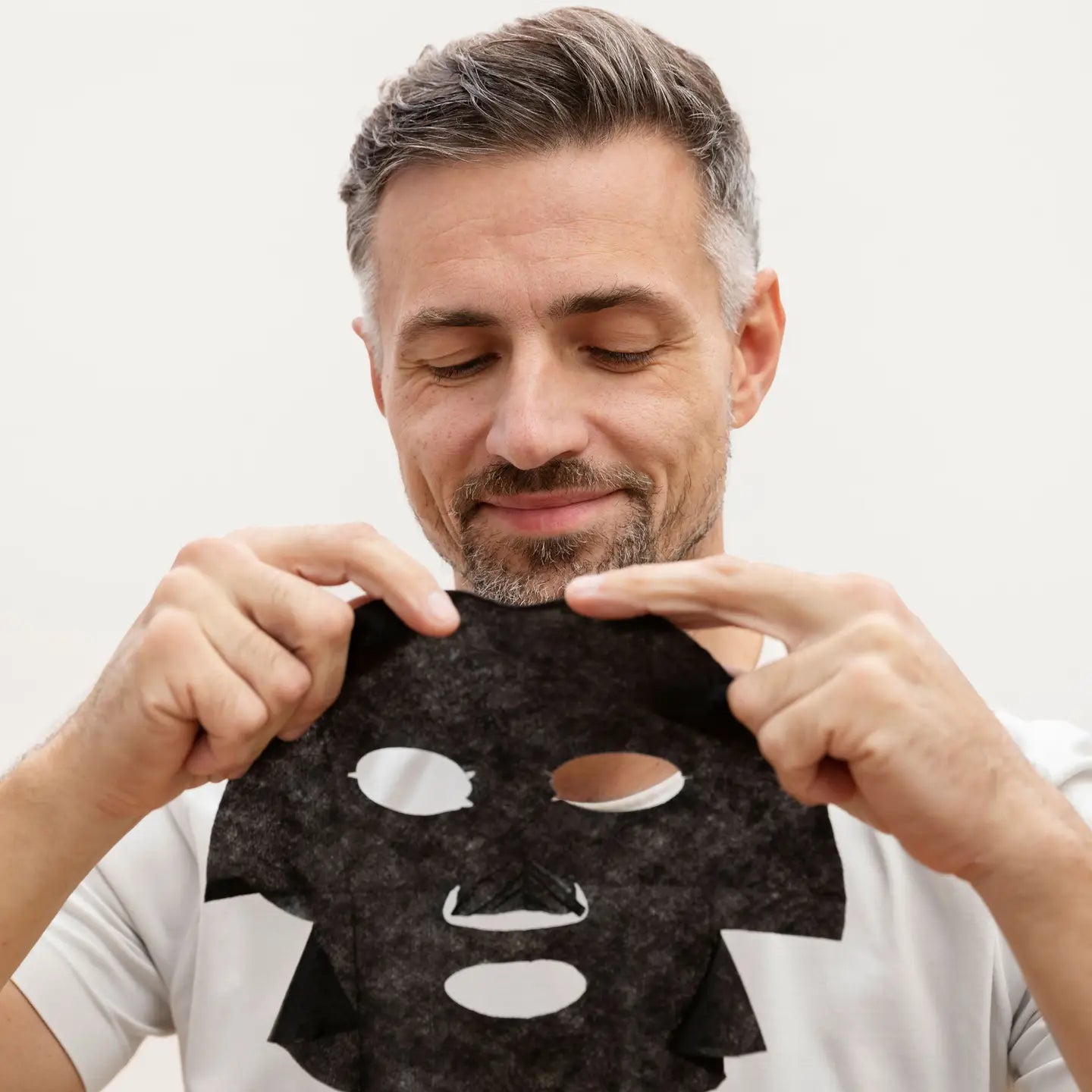 BARBER PRO Anti-Ageing Face Sheet Mask - 100% Biodegradable Man Putting In On